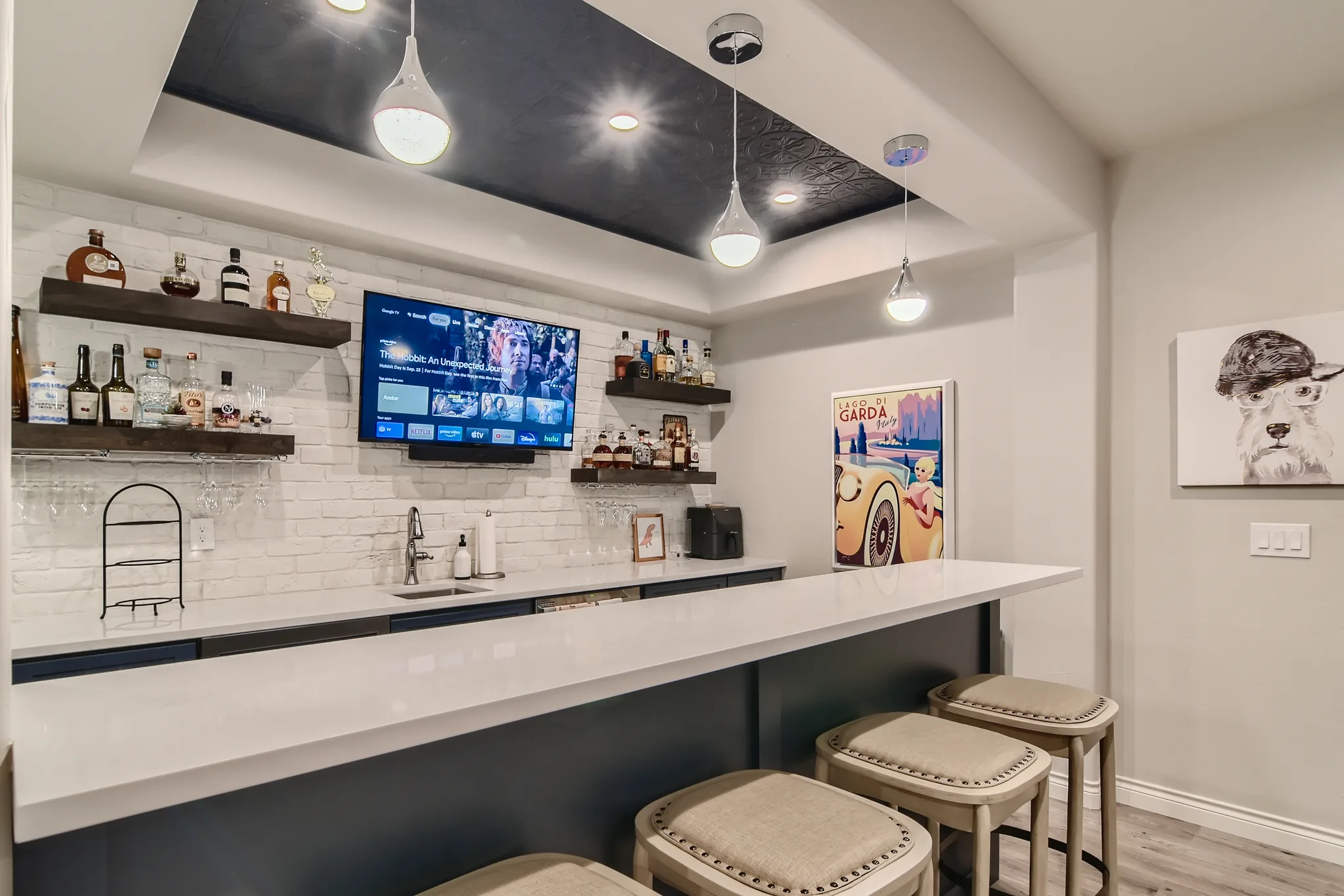 Custom wet bar in a finished basement by DG Home Pro in Westminster, Colorado